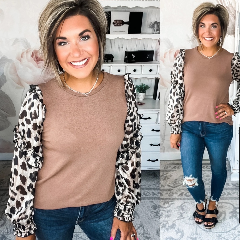 Leopard sleeve knit top by Hailey & Co. is NWT. Size small